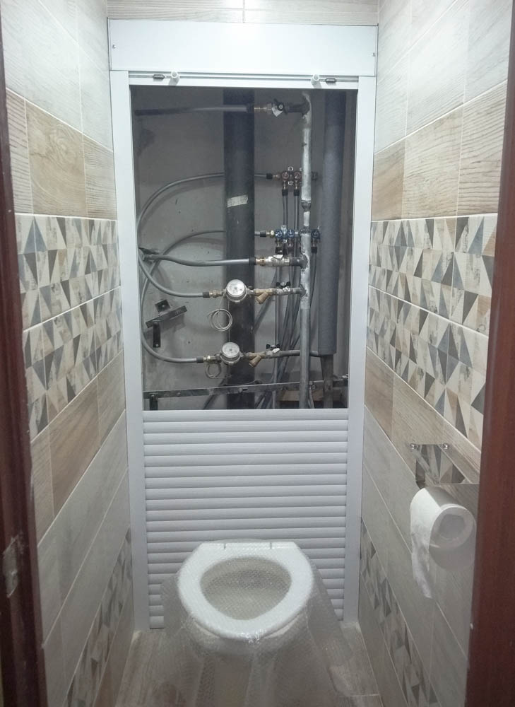 Как спрятать (закрыть) трубы в туалете